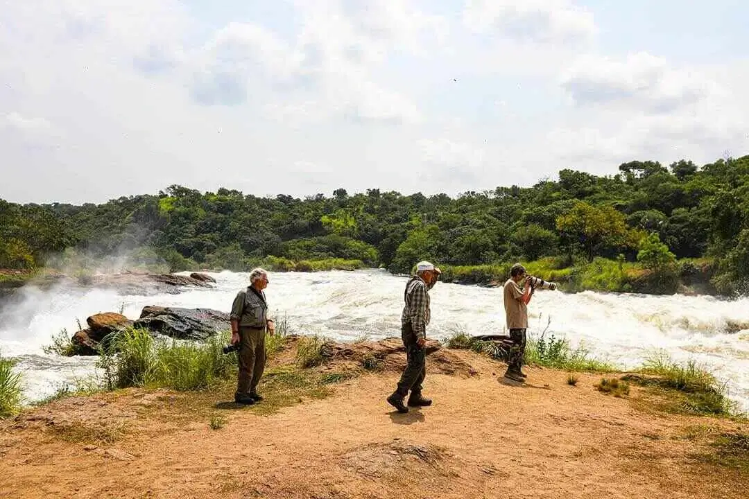 guests on the top of the falls